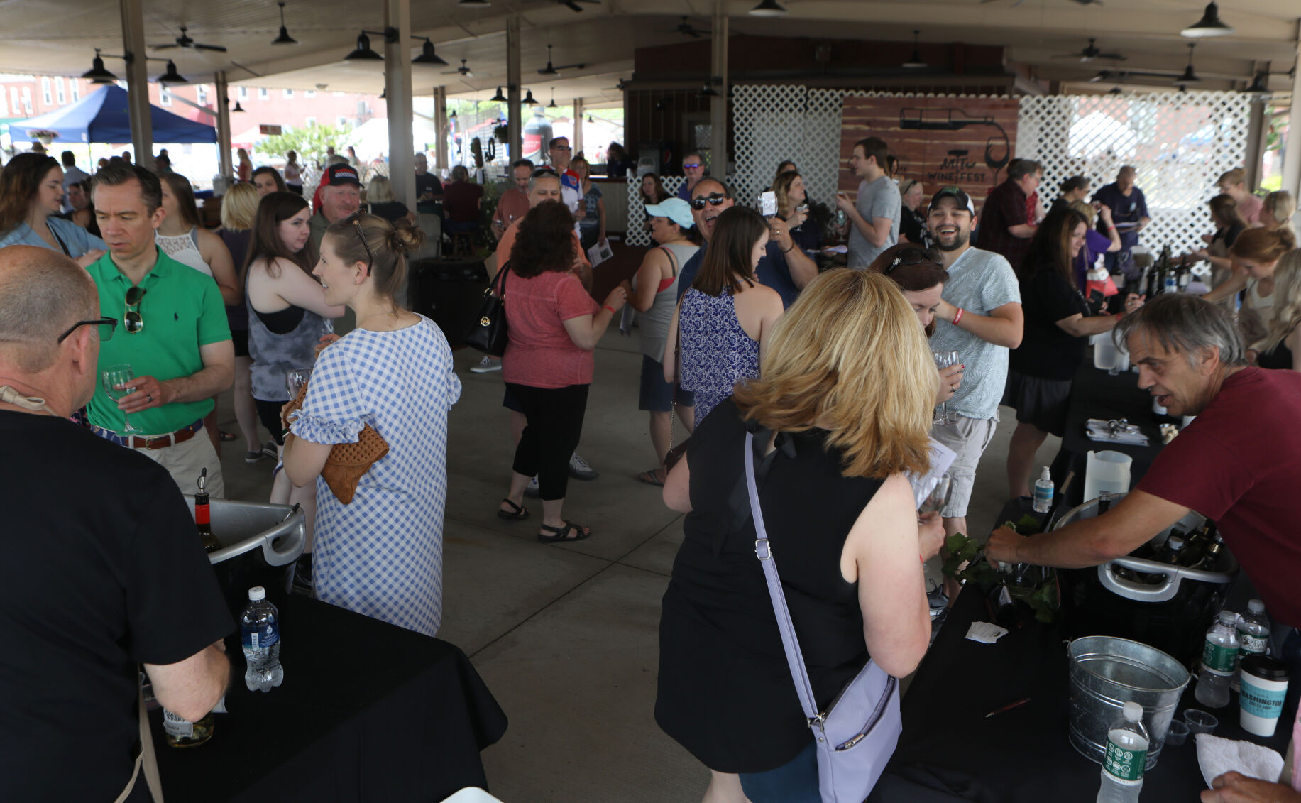 People gather for a wine tasting